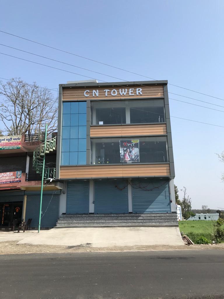 Commercial facade with glazing and rolling shutters