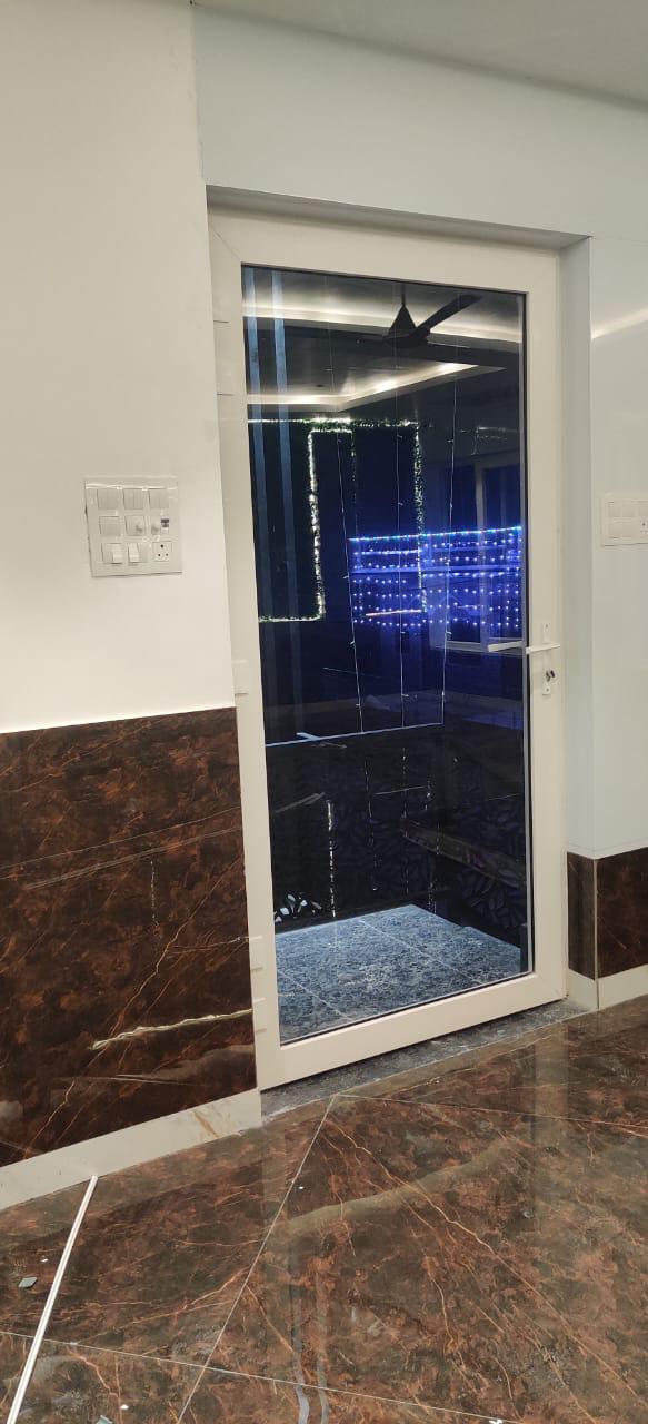 White framed interior glass door